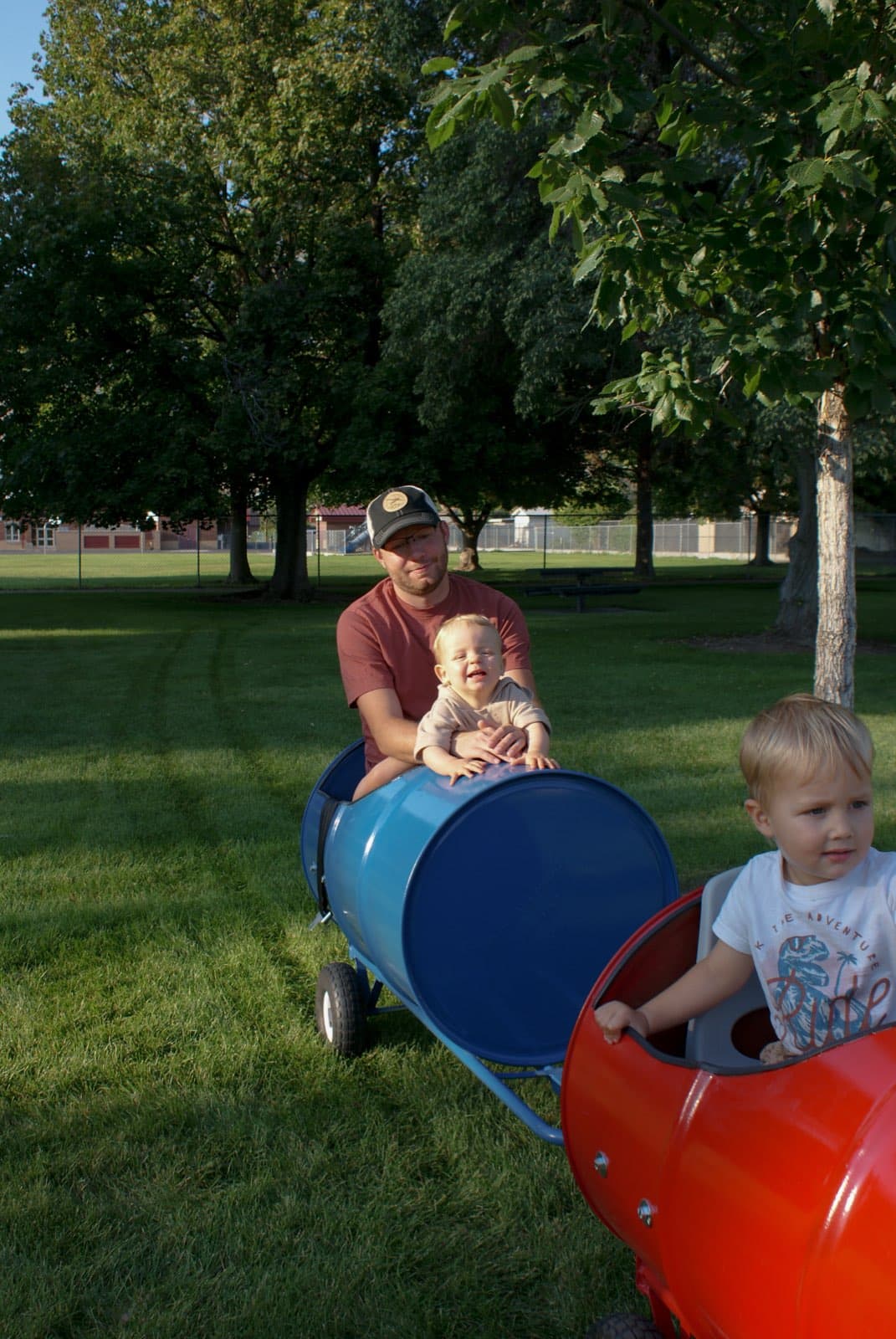 Kids enjoying the barrel train