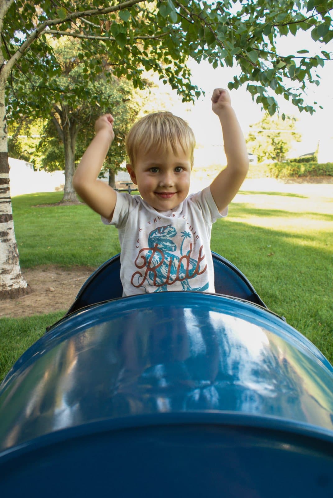 Kids riding the Backyard Barrel Express